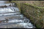 Walls at the water race in need of repair
